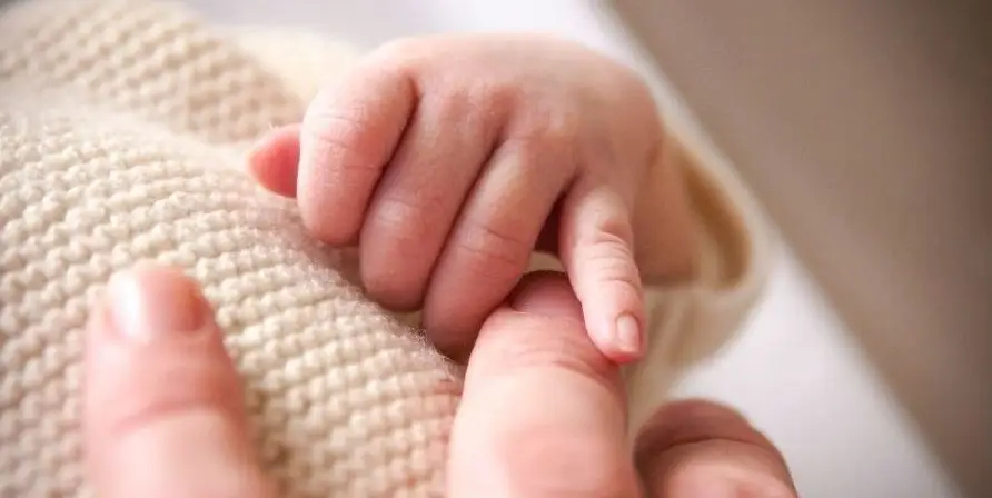 Step Six Baby hand with parent e1634355341580