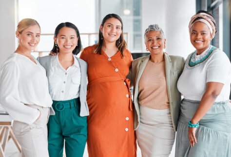 business women only portrait diversity office teamwork inclusion team building empowerment happy asian african senior manager with pregnant woman support goals job success