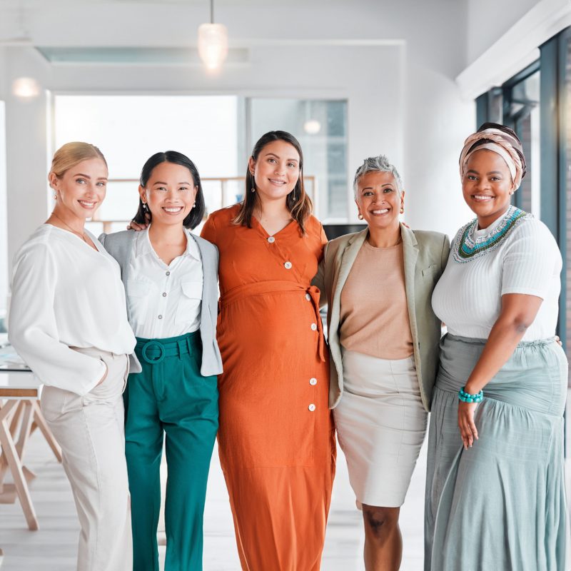 business women only portrait diversity office teamwork inclusion team building empowerment happy asian african senior manager with pregnant woman support goals job success scaled